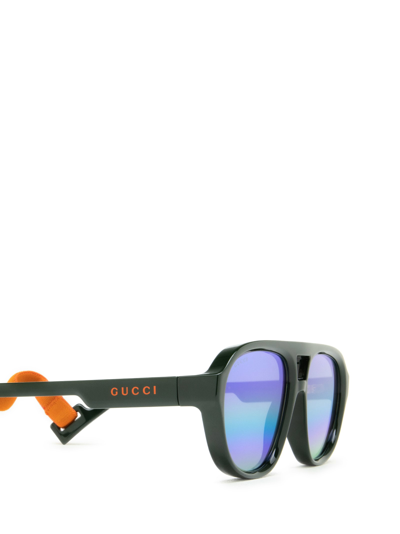 Shop Gucci Gg1239s Green Sunglasses