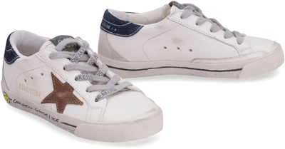 Shop Golden Goose Super-star Low-top Sneakers In White