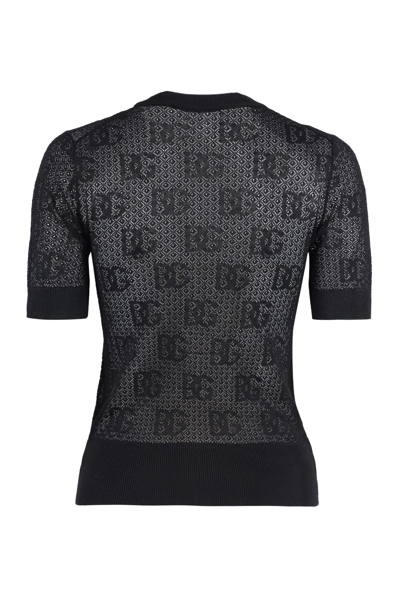 Shop Dolce & Gabbana All Over Dg Logo Sweater In Black