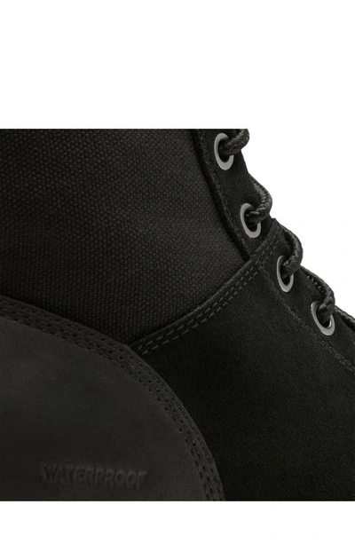 Shop Sorel Carson Six Waterproof Boot In Black/ Dark Stone