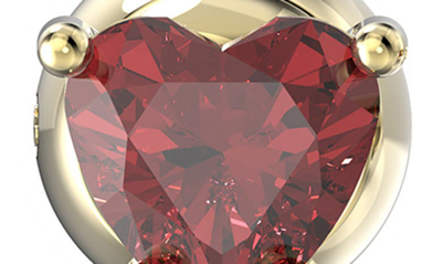 Swarovski Stilla Yellow-gold Toned Brass And Zirconia Stud Earrings In Red