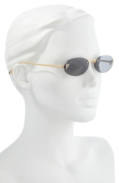 Fendi 54mm Oval Sunglasses In Shiny Endura Gold / Smoke