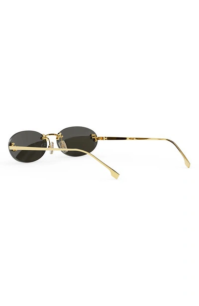 Fendi 54mm Oval Sunglasses In Shiny Endura Gold / Smoke