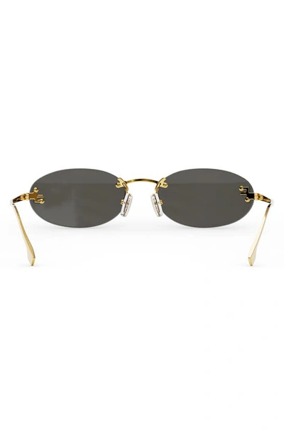 Fendi 54mm Oval Sunglasses In Shiny Endura Gold / Smoke