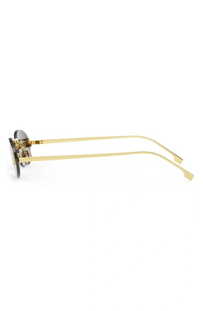 Fendi 54mm Oval Sunglasses In Shiny Endura Gold / Smoke