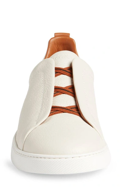 Shop Zegna Triple Stitch Deerskin Slip-on Sneaker In White