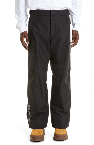 Shop Moncler Stretch Nylon Cargo Ski Pants In Black