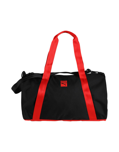 Shop Puma X Vogue Duffel Bags In Black