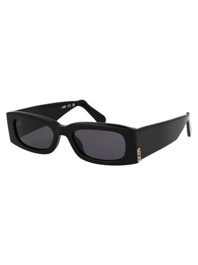 Shop Gcds Gd0020 Sunglasses In 01a Black