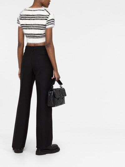 Shop Valentino High-waisted Wide-leg Trousers In Black