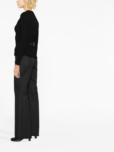 Shop Courrèges Logo-embroidered Bootcut Trousers In Schwarz