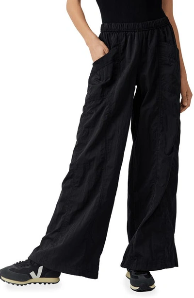 Shop Free People Fp Movement Off The Record Wide Leg Pants In Black