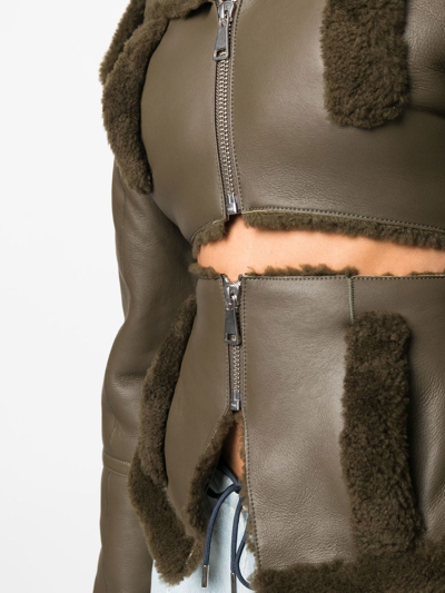Andreädamo Cut-out Shearling-trim Leather Jacket In Grün