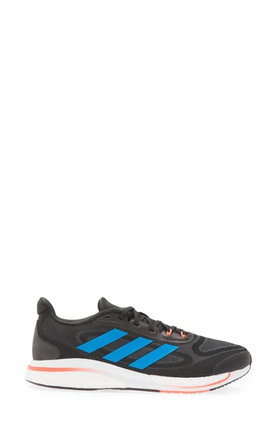 Shop Adidas Originals Supernova Running Shoe In Black/ Blue