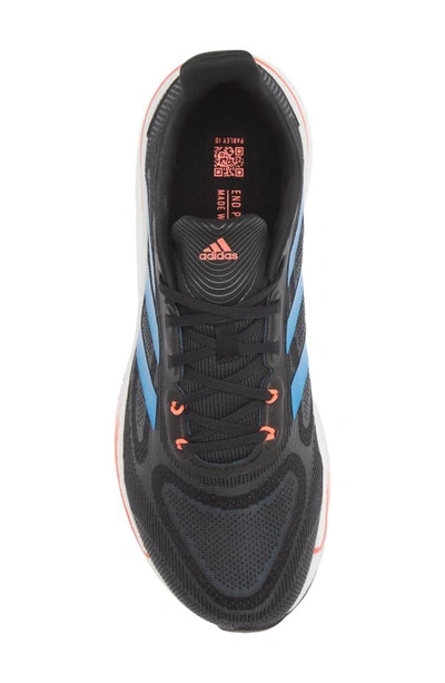 Shop Adidas Originals Supernova Running Shoe In Black/ Blue