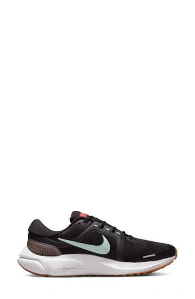 Shop Nike Air Zoom Vomero 16 Sneaker In Black/ Mint/ Canyon Rust