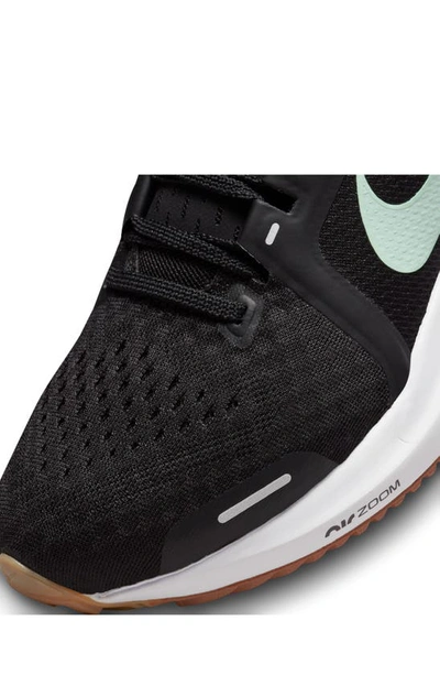 Shop Nike Air Zoom Vomero 16 Sneaker In Black/ Mint/ Canyon Rust