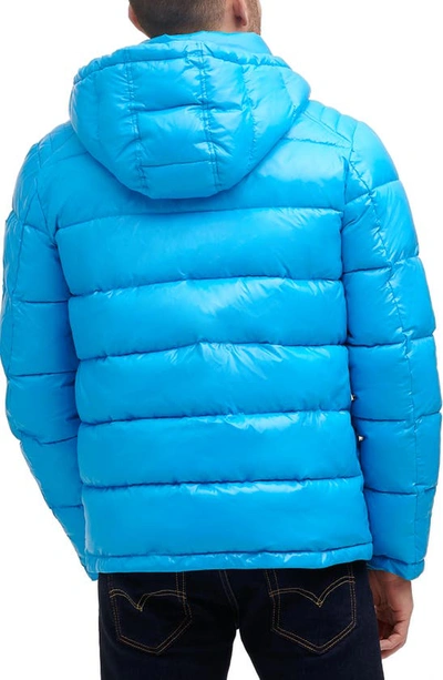 Shop Guess Hooded Solid Puffer Jacket In Sky