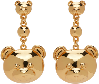 Shop Moschino Gold Dangly Teddy Earrings In A0606 Gold