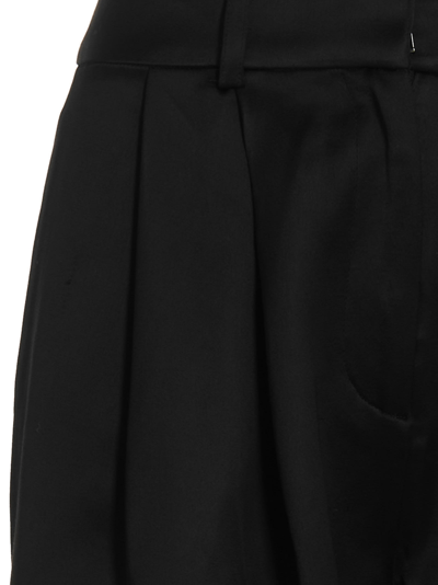 Shop Co Pants With Front Pleats In Black