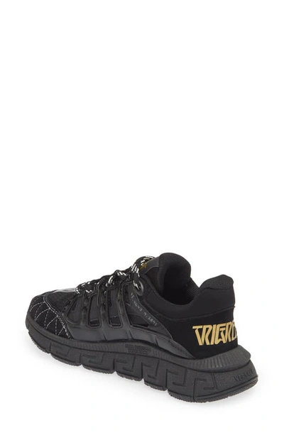 Shop Versace Kids' Trigreca Sneaker In Black Gold