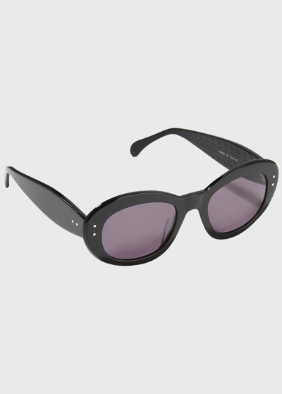 Shop Alaïa Thick Round Acetate Sunglasses In Shiny Black