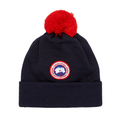 Shop Canada Goose Kids Navy Pompom Wool Beanie, Beanie, Ribbed In Blue