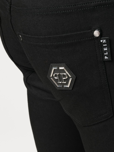 Shop Philipp Plein Hexagon Low-rise Slim-cut Jeans In Schwarz