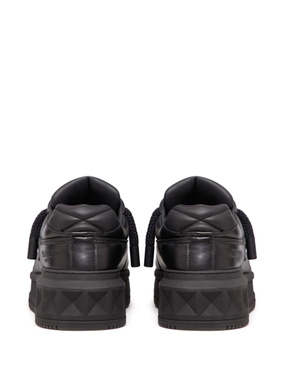 Shop Valentino One Stud Xl Leather Sneakers In Black