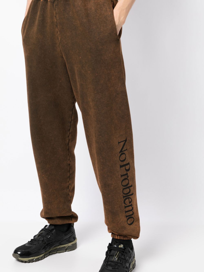 Shop Aries Tie-dye Cotton Track Pants In Brown