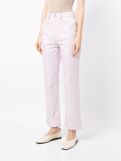 Shop Nanushka Turn-up Jeans In Pink