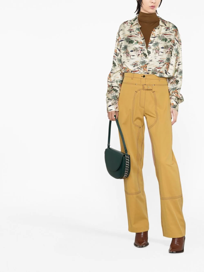 Shop Stella Mccartney Buckle-detail Straight Trousers In Gelb