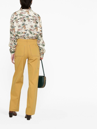 Shop Stella Mccartney Buckle-detail Straight Trousers In Gelb