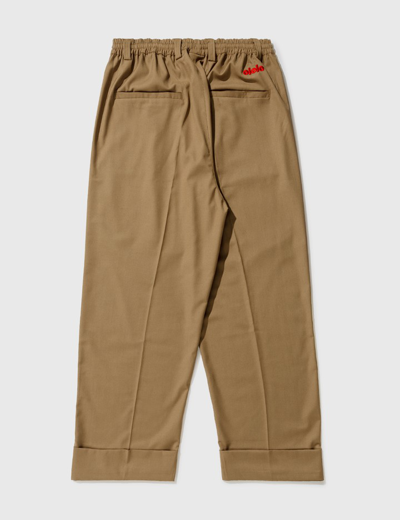 Shop Ololo Loose Fit Golf Trousers In Beige