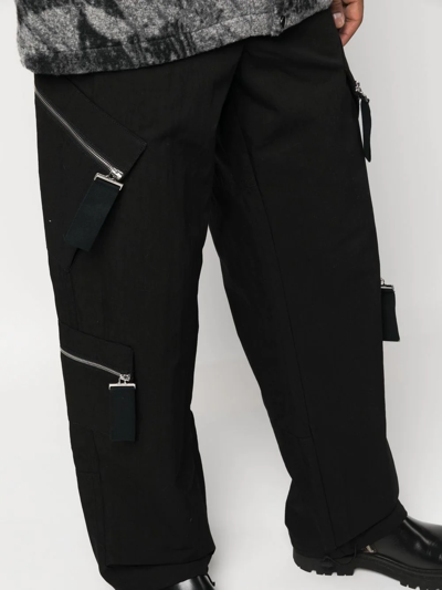 Shop Jacquemus Multiple-pocket Straight-leg Trousers In Black