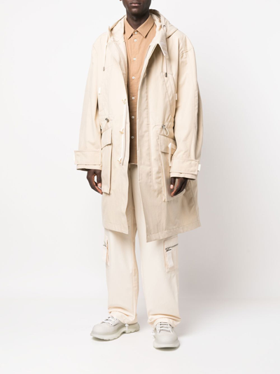 Shop Jacquemus Embroidered-logo Zip-fastening Coat In Neutrals