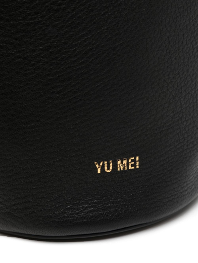 Shop Yu Mei Embossed-logo Bucket Bag In Schwarz
