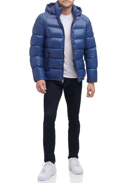 Shop Guess Hooded Solid Puffer Jacket In Indigo