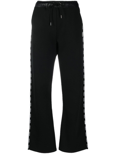 Shop Moncler Logo-patch Wide-leg Trousers In Black