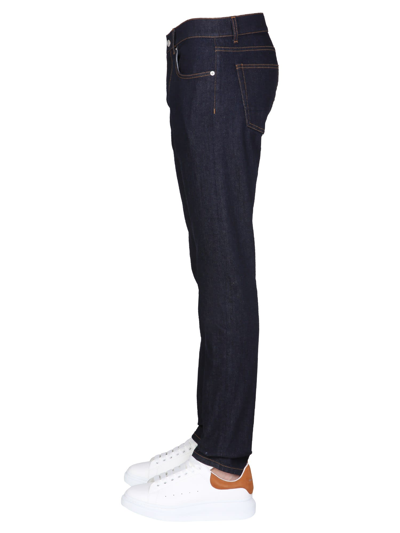 Shop Alexander Mcqueen Jeans With Signature Logo Embroidered In Navy