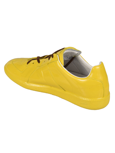 Shop Maison Margiela Glossy Cross-lace Sneakers In Yellow