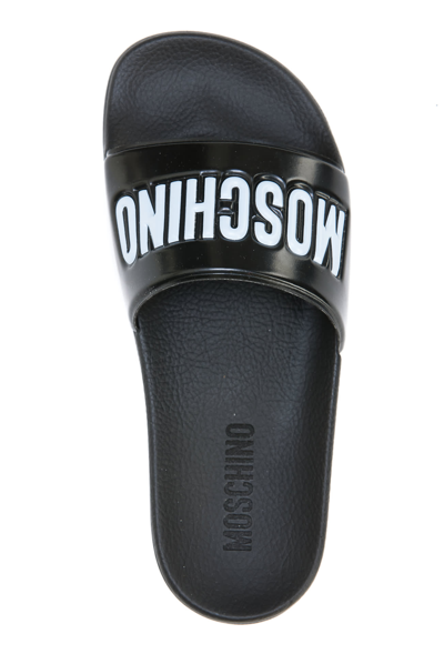 Shop Moschino Logo Slide Sandals In Black