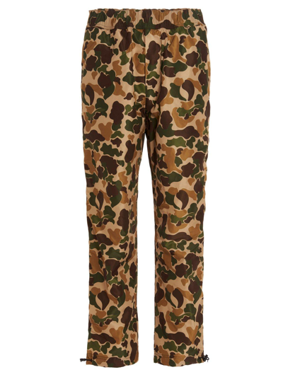 Shop Palm Angels Camouflage Printed Elastic Waist Pants In Army Green