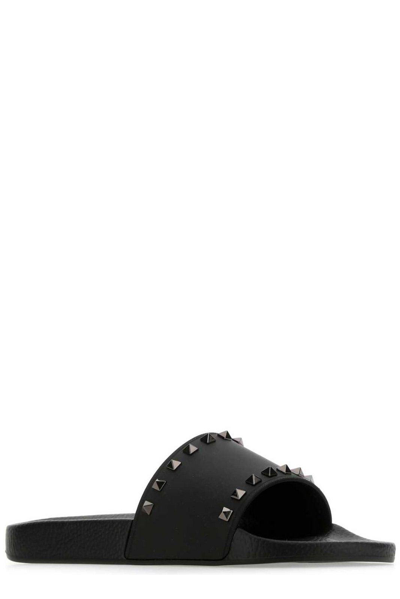 Shop Valentino Rockstud Slip-on Slides In Black