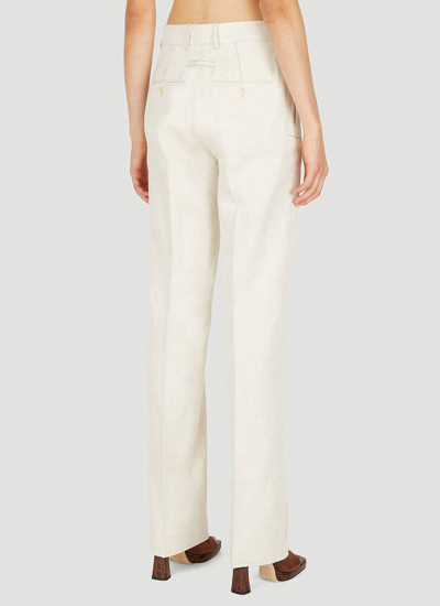 Shop Jacquemus Stitched Suit Pants In 130 Light Beige