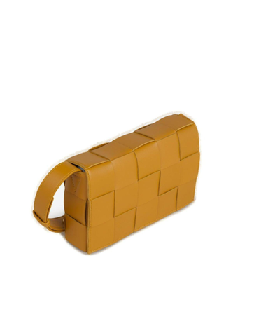 Shop Bottega Veneta Cassette Shoulder Bag In Cob Gold