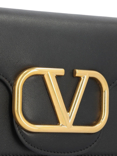 Shop Valentino Vlogo Plaque Chained Shoulder Bag In Nero