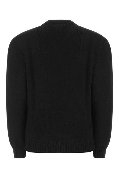 Shop Prada V-neck Ribbed Knit Sweater In Nero