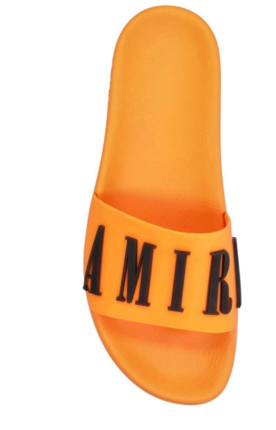 Shop Amiri Logo Embossed Pool Slides In Orange