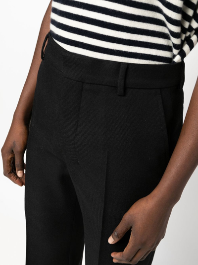 Shop Ami Alexandre Mattiussi Pressed-crease Flared Tailored Trousers In Black